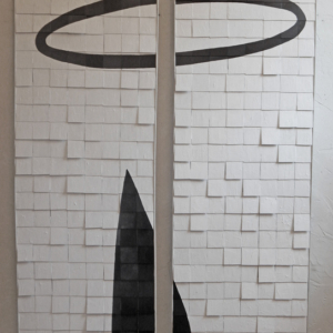 A pair of one foot wide abstract images painted on tiles;  a large black halo is floating in a background of off-white.