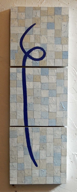 An abstract stacked triptych of painted tiles in soft baby blue, tan and off white with a large dark blue flourish line across all three.