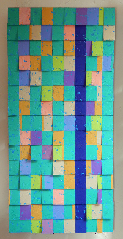 An abstract image painted on tiles. Various pastel like colors of teal, purple, blue, green, and orange with a bold dark blue stripe. near the right side.