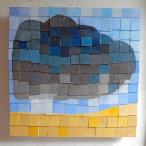 An abstract image painted on tiles of a dark storm cloud. The sky is represented by various shades of blue and the ground by a bed of golden tiles.
