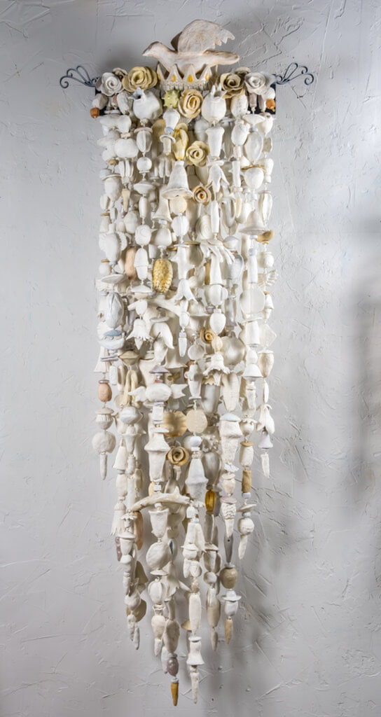 The White King (2023) by Oklahoma mixed-media artist Paul Medina is made from low fired clay, with mixed media, nylon cord, and steel.