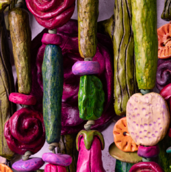 Close-up of vibrant, abstract roses and other flowers in red, pink, and orange hues from the mixed media artwork &quot;Bouquet For Grace&quot; by Oklahoma artist Paul Medina.