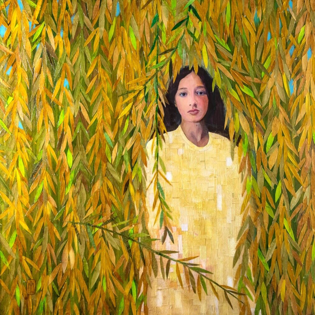 Wading Through The Willows is a 36" x 36" mixed media piece by Oklahoma artist Paul Medina. It is a painted paper collage on canvas picturing a young woman with dark hair, wearing a yellow dress, surrounded by a thick drape of golden, green, and yellow willow branches against a blue sky.